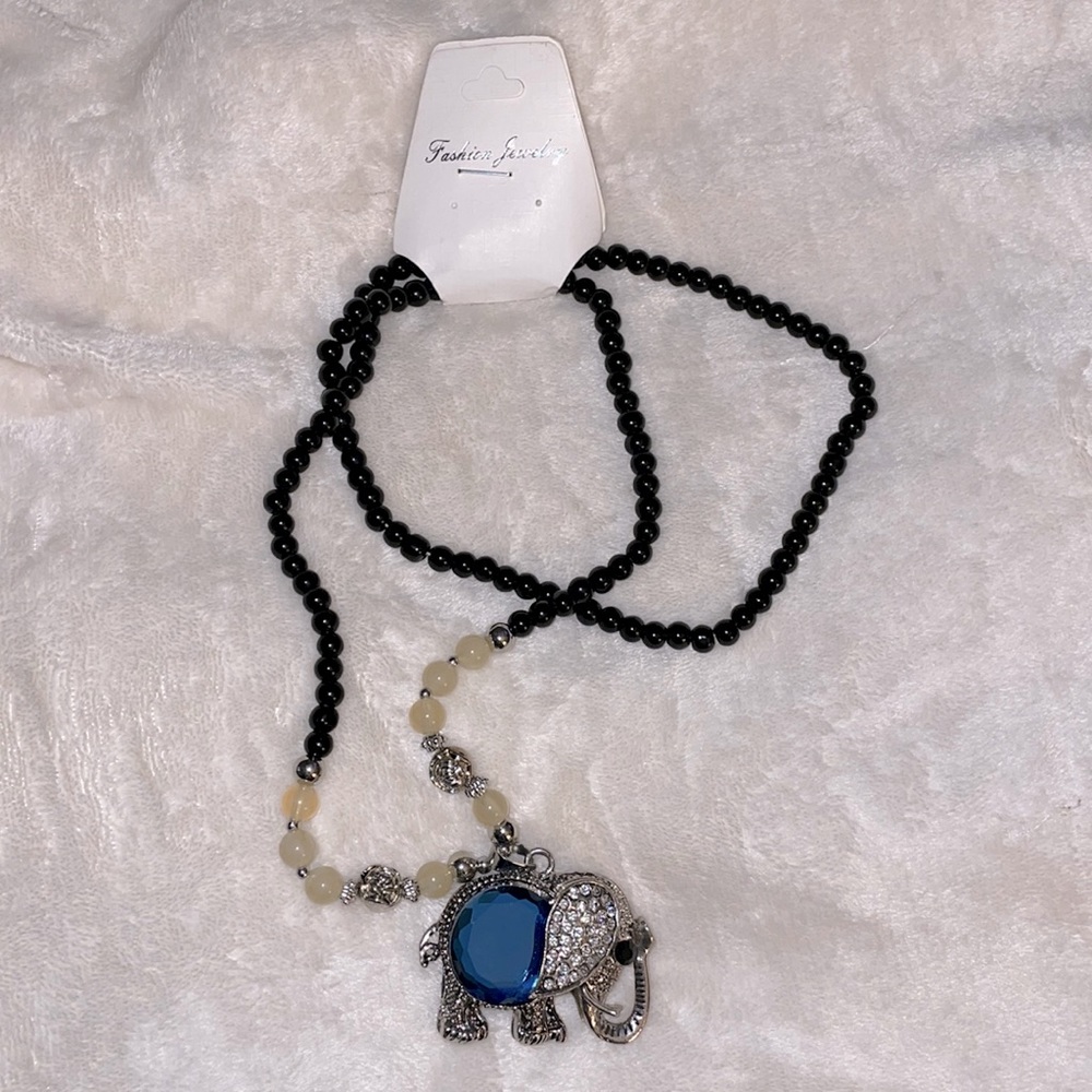 Blue stone elephant pendant necklace